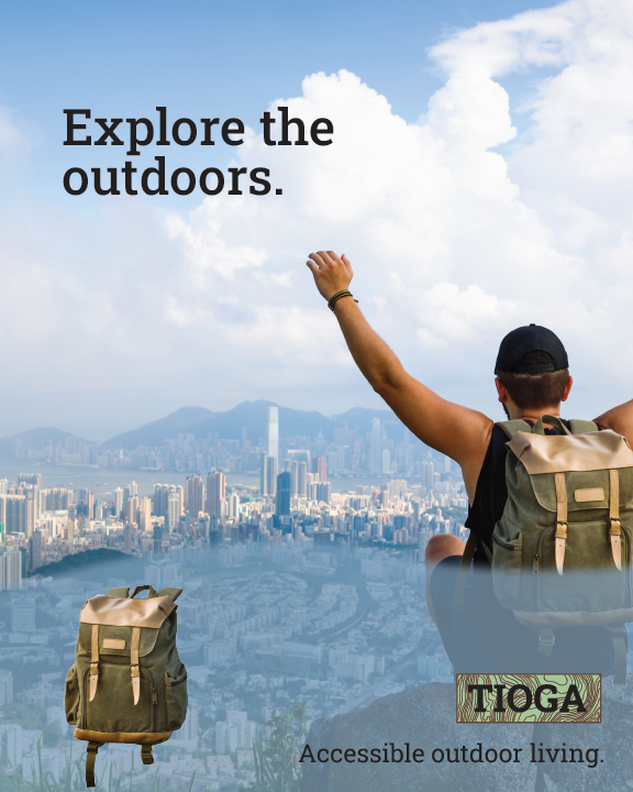 This magazine advertisement 
				shows a man with a backpack cheering as he looks at a city far away.